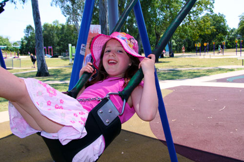 Wide Bay Kids girl on swing